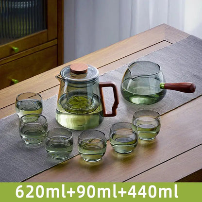 Transparent green decorbites glass teapot with wooden handle and lid with matching glasses for kung fu tea ceremony