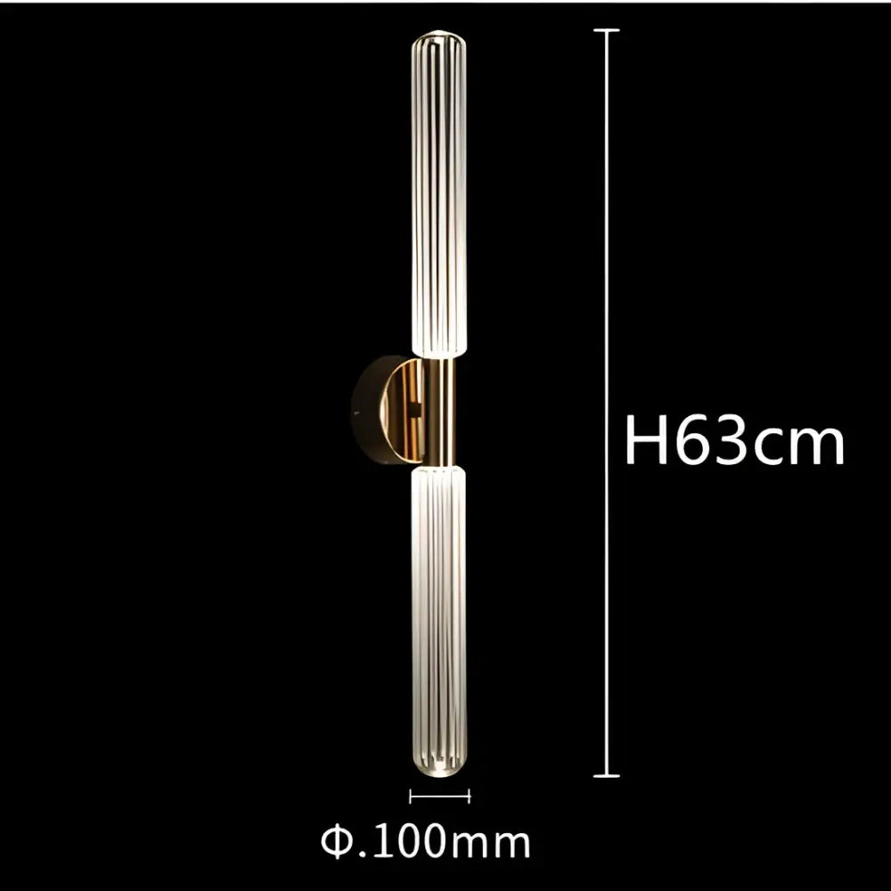 A modern DecorBites glass tubes pendant lamp with two vertical ridged glass tubes and polished brass metal bracket