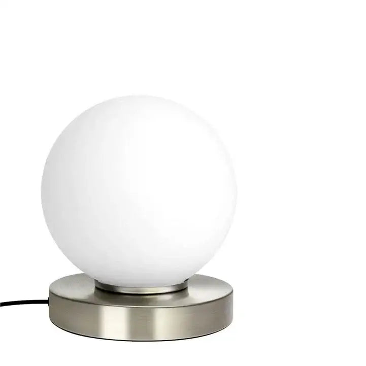Decorbites glass usb bedside lamp featuring a frosted white glass globe on a brushed metal base for bedroom decor