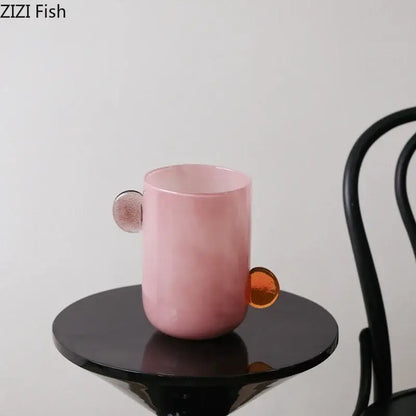Pink ceramic mug with translucent colorful glass handles from decorbites glass vase collection for modern decor