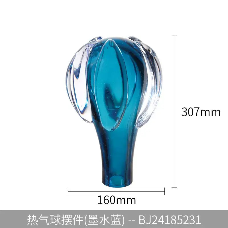 Decorbites glass vase hot air balloon ornament in translucent teal blue glass with clear sculpted wing extensions