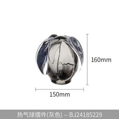 A sleek gray DecorBites glass vase hot air balloon ornament made from translucent glass with a glossy finish