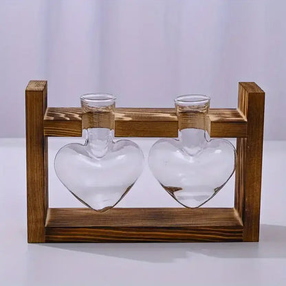 Decorbites glass vase terrarium featuring two clear heart-shaped vases with narrow necks in rustic wooden frame