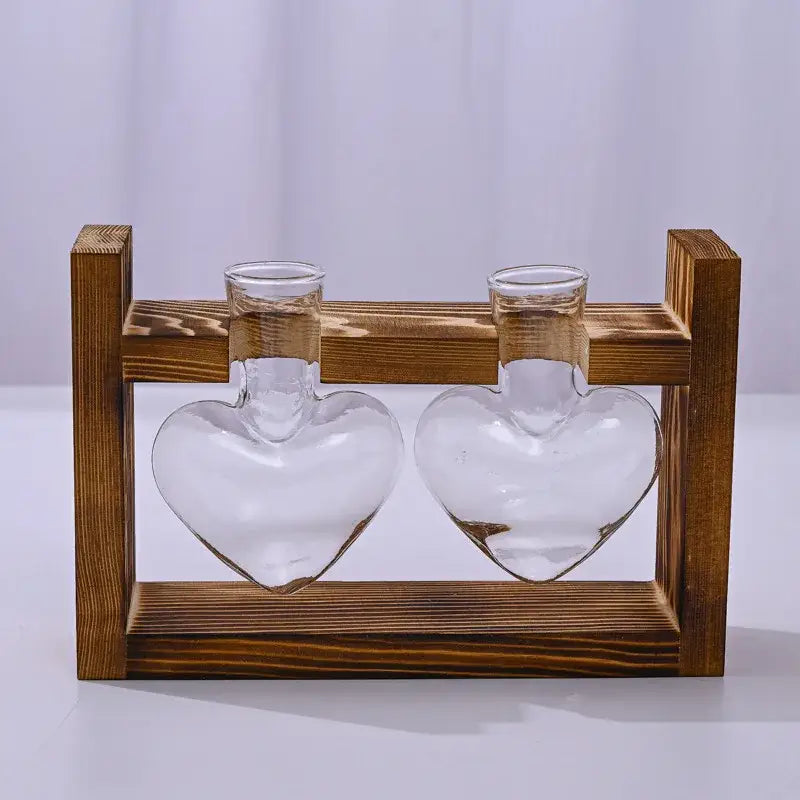 Decorbites glass vase terrarium features two clear heart-shaped vases with narrow necks in a rustic wooden frame for heart hydroponic plant display