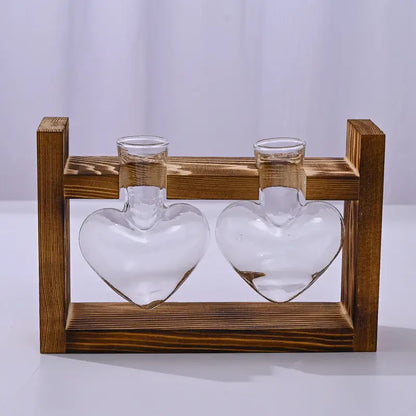 Decorbites glass vase terrarium features two clear heart-shaped vases with narrow necks in a rustic wooden frame for heart hydroponic plant display