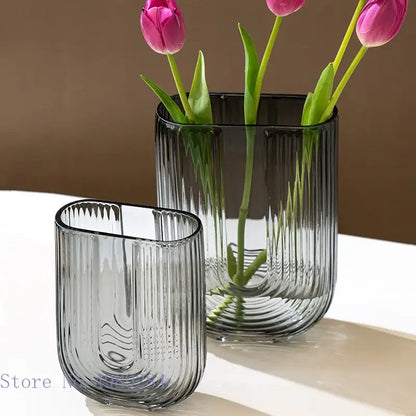 Two sleek translucent gray decorbites glass vases with vertical ribbed textures for modern home wedding decor