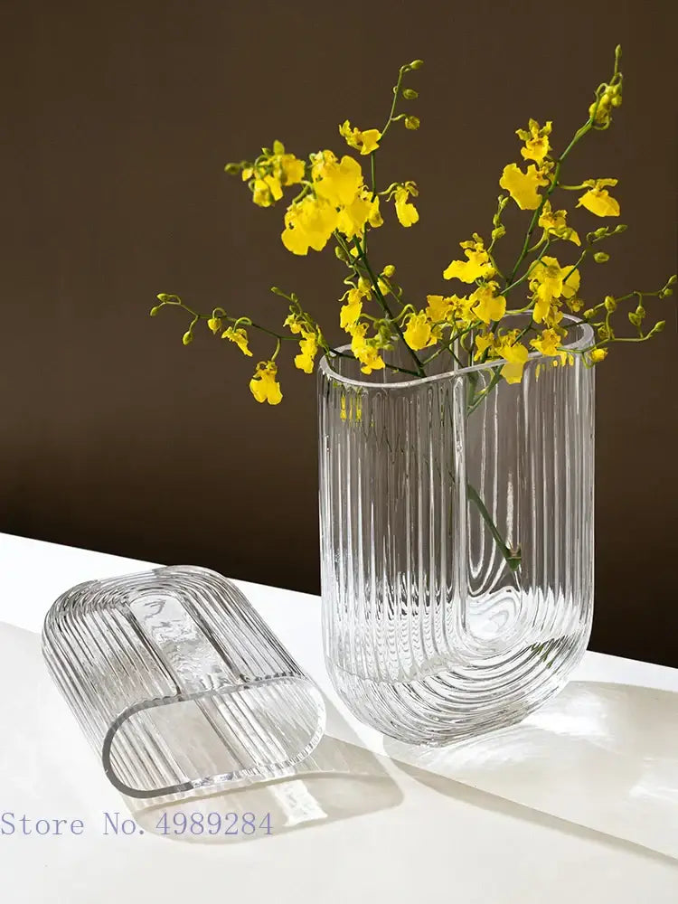 Clear decorbites glass vase with vertical ridges and modern curved design for home and wedding decoration