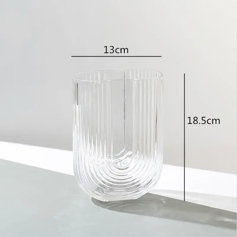 Clear glass decorbites glass vase with vertical ribbed texture and modern curved design for home and wedding decoration