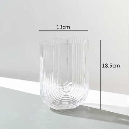 Clear glass decorbites glass vase with vertical ribbed texture and modern curved design for home and wedding decoration