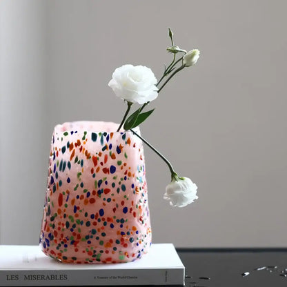 A pink decorbites glass vase with colorful dots holds white flowers for home decor and hydroponic plants
