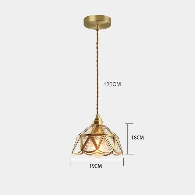 A brass-finished decorbites glass vintage pendant light with geometric faceted glass shade and twisted cord suspension
