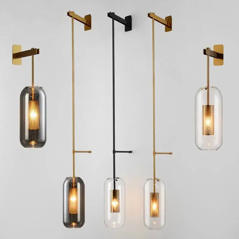 Modern minimalist decorbites glass wall art light with brass and black metal arms and clear smoky gray glass shades