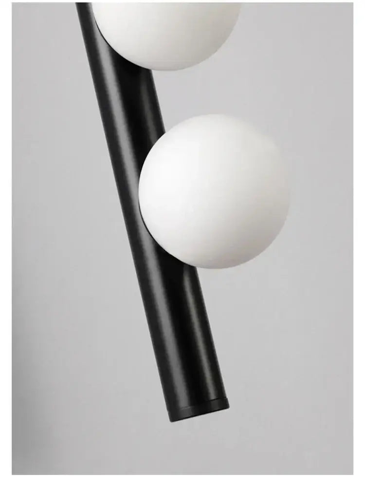 Black cylindrical decorbites glass wall lamp with two white spherical glass shades for living room and bedroom
