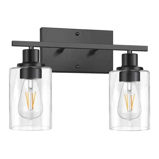 Black metal decorbites glass wall lamp with two clear glass cylinders and exposed filament bulbs for indoor lighting