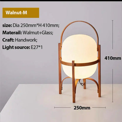 Walnut-m wood metal table lamp with warm glowing glass globe and handcrafted walnut frame by decorbites glass