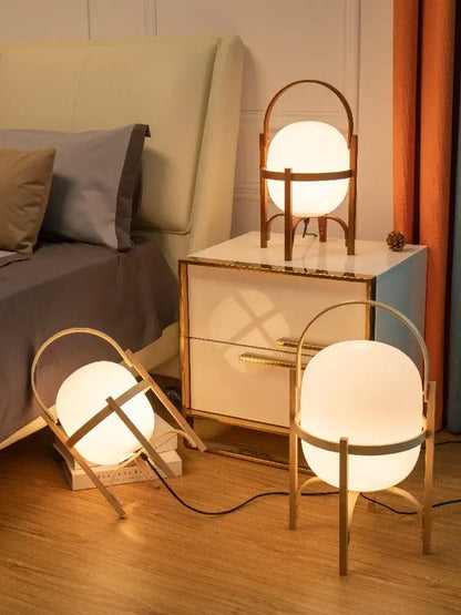 Decorbites glass and wood metal table lamp with gold toned frame and frosted spherical shade for japanese style rooms