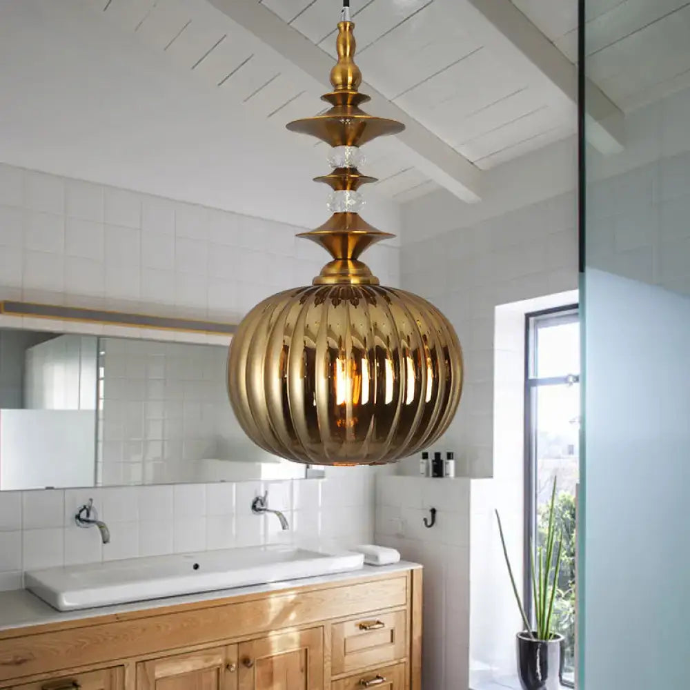Golden ribbed glass pendant light with brass-finished metal top for dining room in chrome copper gold finishes compatible with led incandescent fluorescent bulbs