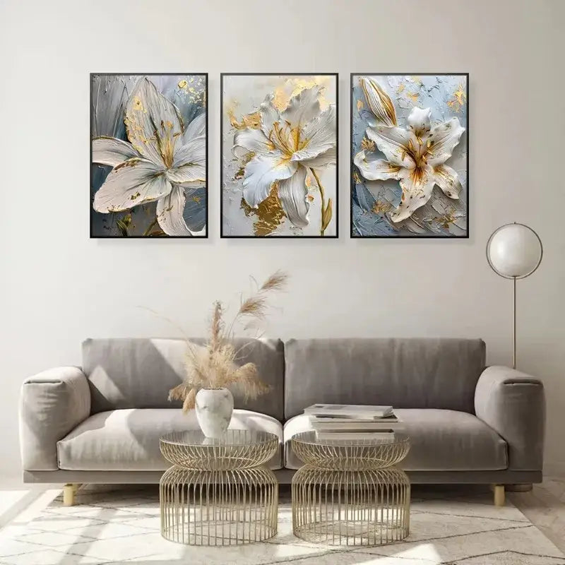 Set of three DecorBites™ wall art flower canvas posters with white and gold floral motifs on textured gray backgrounds