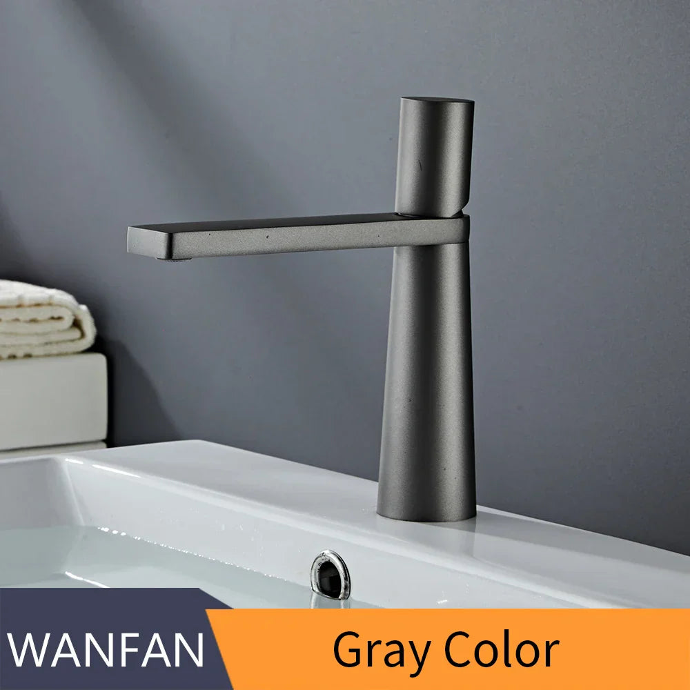 Gray matte-finish metal basin faucet with modern minimalist design in decorbites gold brass for bathroom sink