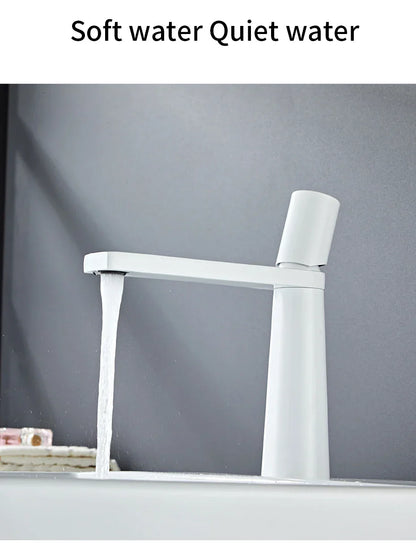 White modern basin faucet with sleek brushed gold brass finish for bathroom sink by decorbites