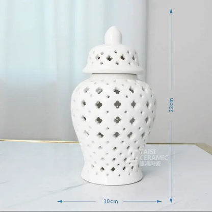 DecorBites gold ceramic carved temple jar in white with intricate lattice cutouts for elegant home decor