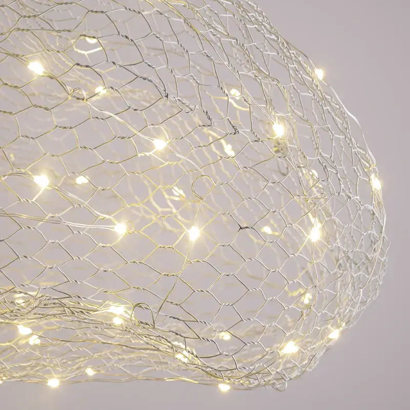 Decorbites™ gold cloud pendant lights featuring a delicate silver wire mesh lantern with warm white led lights