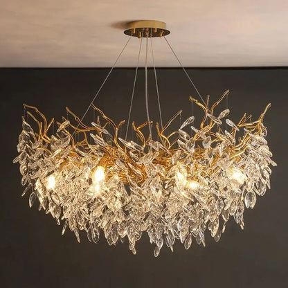 Decorbites gold crystal led chandelier with gold-toned leaf branches and cascading clear crystal leaves for home lighting