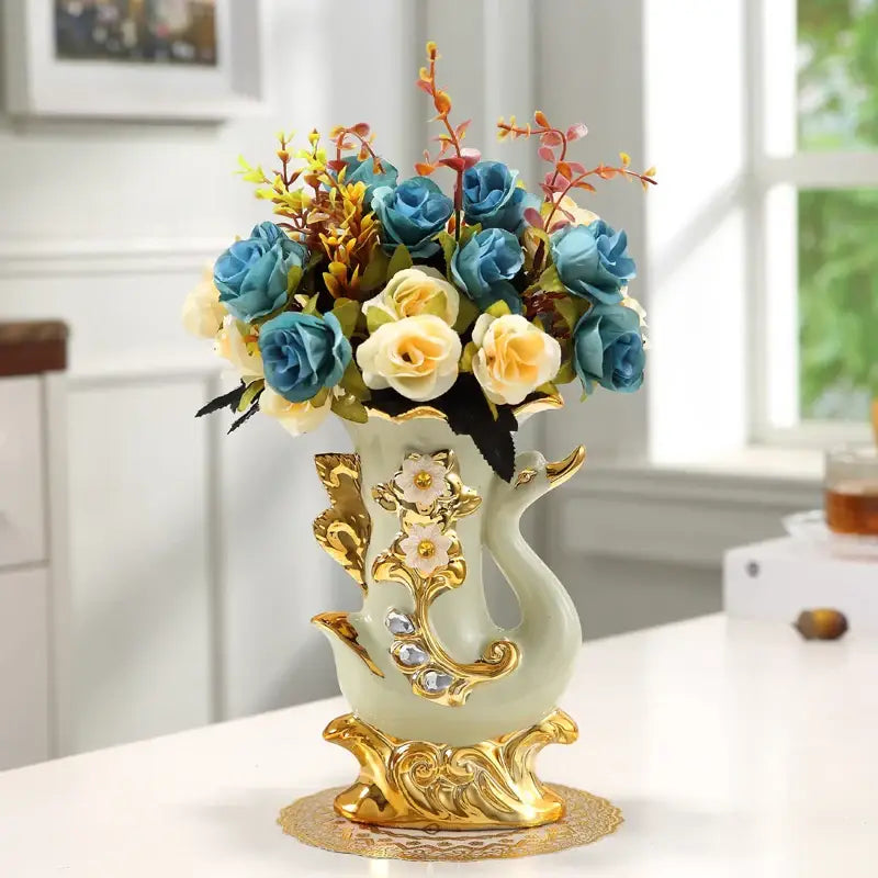 DecorBites™ gold glass vase with decorative porcelain swan design featuring gold accents and embedded crystals