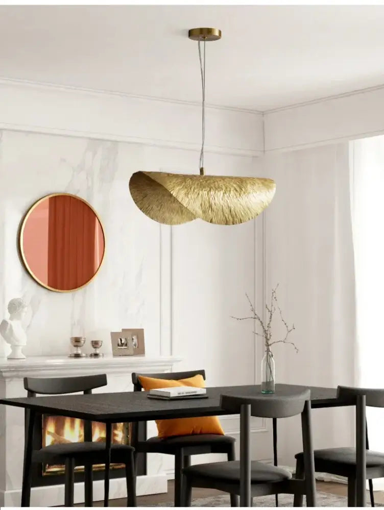 DecorBites gold lotus leaf pendant light with textured woven surface and brass-finished hardware for modern decor