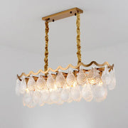 Gold-toned DecorBites island pendant with twisted chain and clear K9 crystal teardrop pendants for dining room lighting