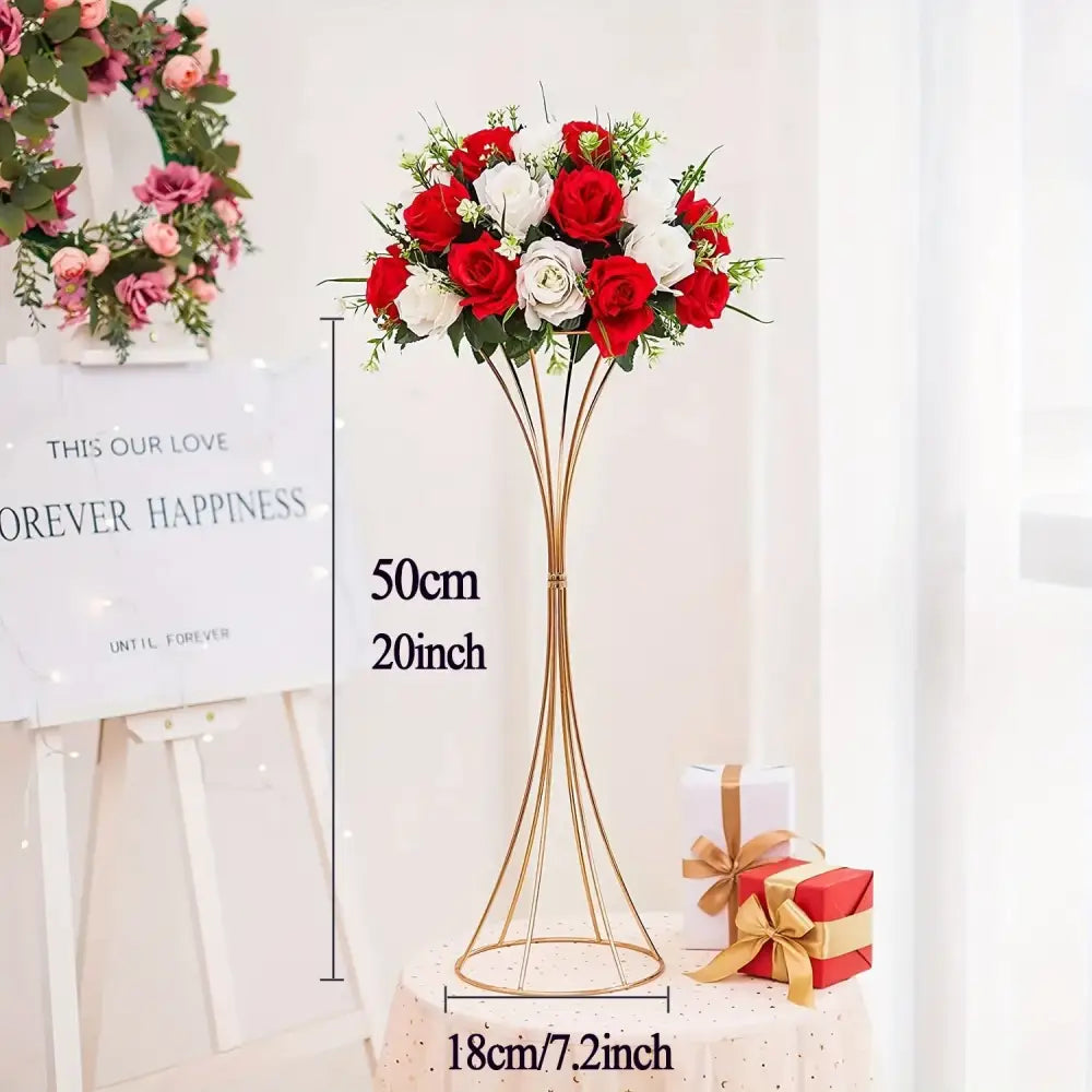 Decorbites gold metal trumpet flower stand vase holding a bouquet of red and white artificial roses