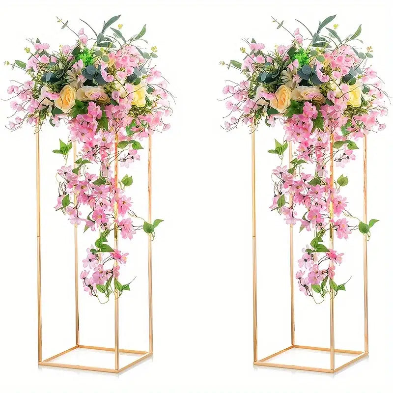 Decorbites gold metal vase set featuring floor-standing floral arrangements with cascading pink and yellow flowers