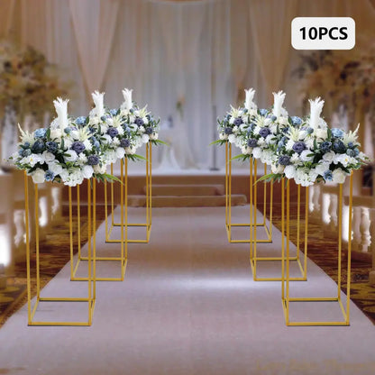 DecorBites™ gold metal wedding flower stands with white and blue artificial flowers and greenery arrangements