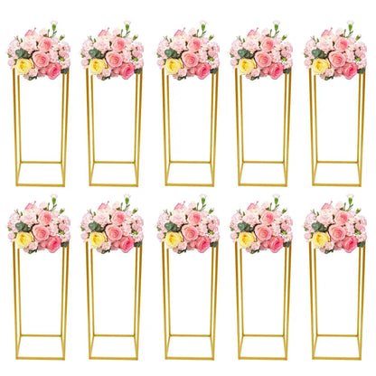 Decorbites™ gold metal wedding flower stand set with gold metal flower stands topped with pink and yellow rose bouquets