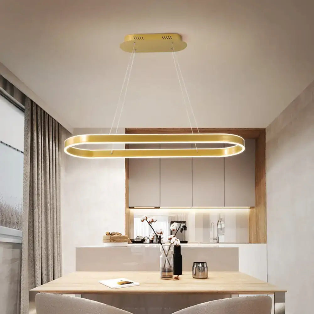 Decorbites gold oval led hanging lamp kit with sleek metallic design and illuminated edges for modern dining room