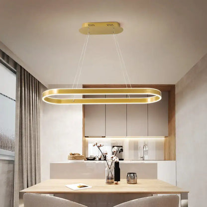 Decorbites gold oval led hanging lamp kit with sleek metallic design and illuminated edges for modern dining room