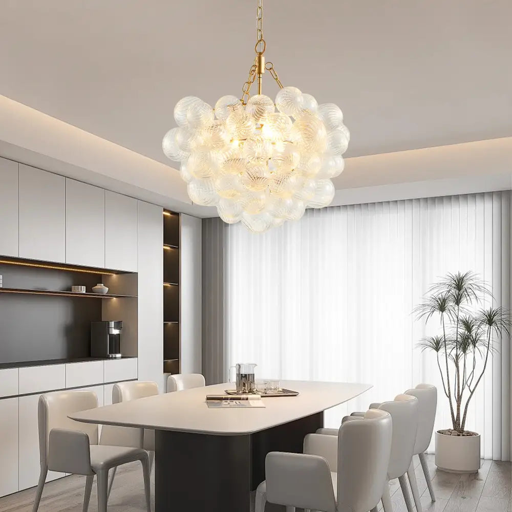 Decorbites gold pendant chandelier with adjustable height features translucent bubble glass orbs on a gold pendant light