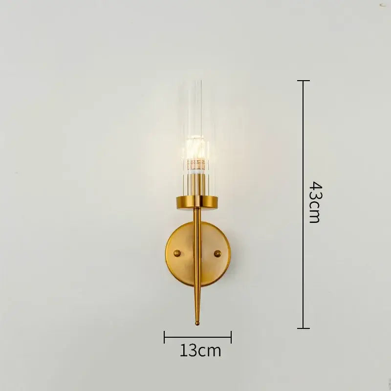 Gold plated nordic living room wall sconce with clear glass cylinder and circular brass plate by decorbites gold plated