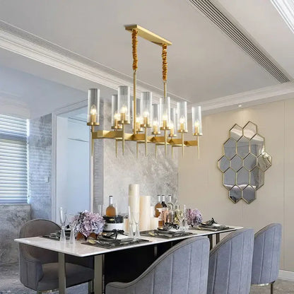 Decorbites gold plated nordic living room chandelier with gold tone, clear glass cylinders, and twisted rope chains