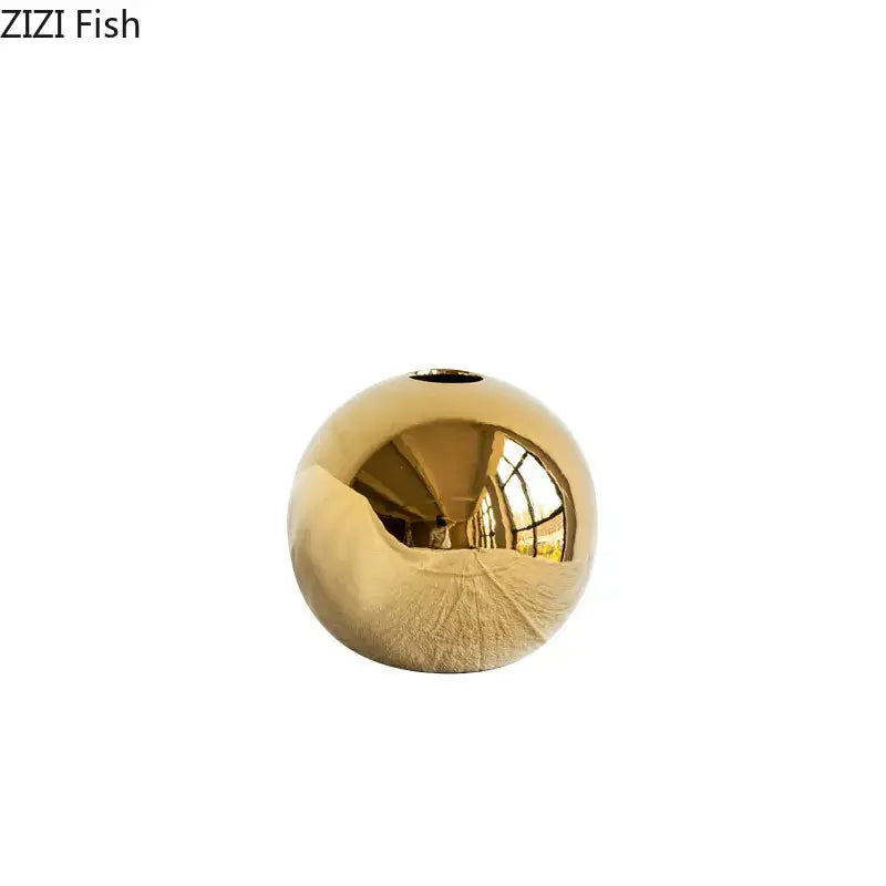 Decorbites™ shiny golden ball ceramic vase with a smooth reflective surface and small opening for home decor