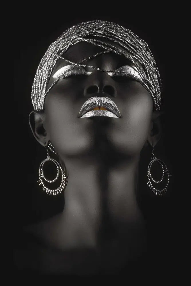 A woman wearing silver beaded headpiece and hoop earrings in decorbites golden jewelry african woman canvas art