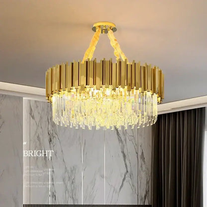 Decorbites golden luxury chandelier with gold-toned vertical metal bars and cascading crystal droplets for living room
