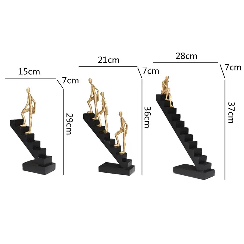 Set of three decorbites golden man climber gold-toned figurines on black stairs for home decor ornaments