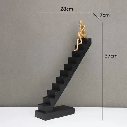 Decorbites golden man climber staircase abstract sculpture in gold metal atop black base for home decor ornaments
