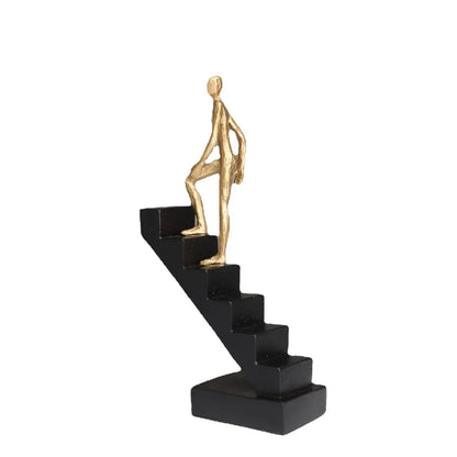 Decorbites golden man climber abstract golden figurine ascending black stairs sculpture home decor ornament