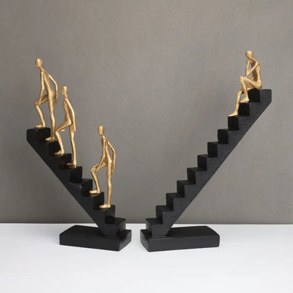 Decorbites golden man climber staircase abstract golden figurines on black v-shaped bases home decor ornaments