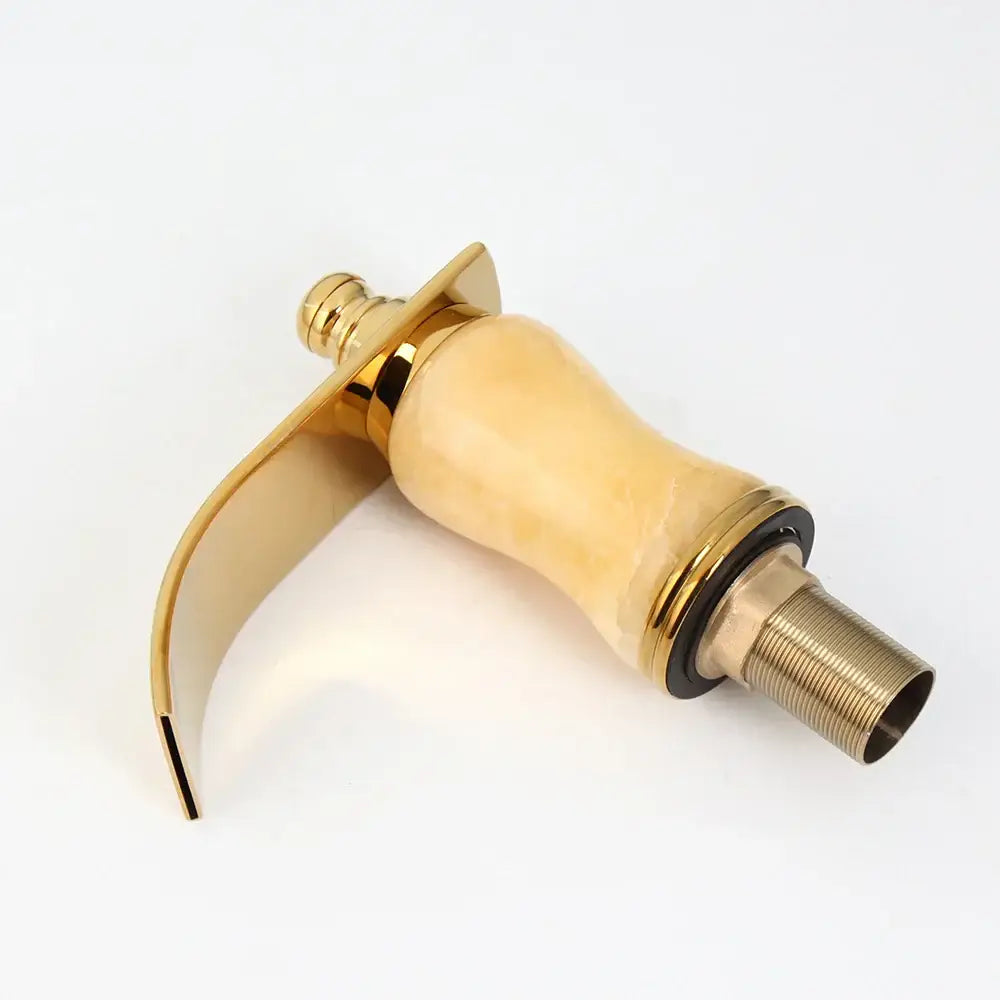 Decorbites golden plated waterfall bathtub faucet with gold finish, beige marble handle, and threaded brass base