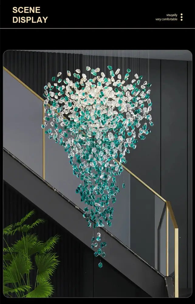 A cascading chandelier with clear and teal green crystal stone beads suspended above a staircase for modern spaces