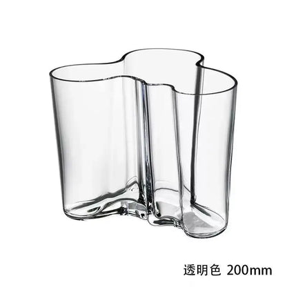 DecorBites™ green glass vase with a distinctive flowing multi-lobed design and smooth curved edges for modern decor
