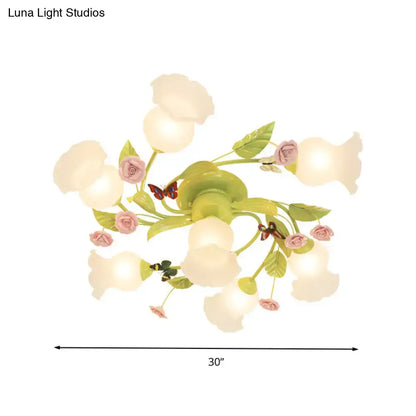 DecorBites™ green opaque glass spiral ceiling light fixture with pastel green and pink floral design and butterfly accents